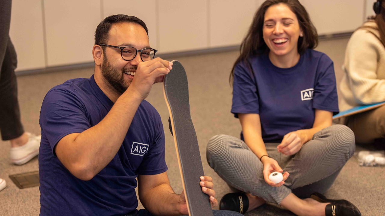 Colleagues volunteering to support Together We Rise during AIG Global Volunteer Month (2023); featuring Justine Valdes, Omar Poyah 